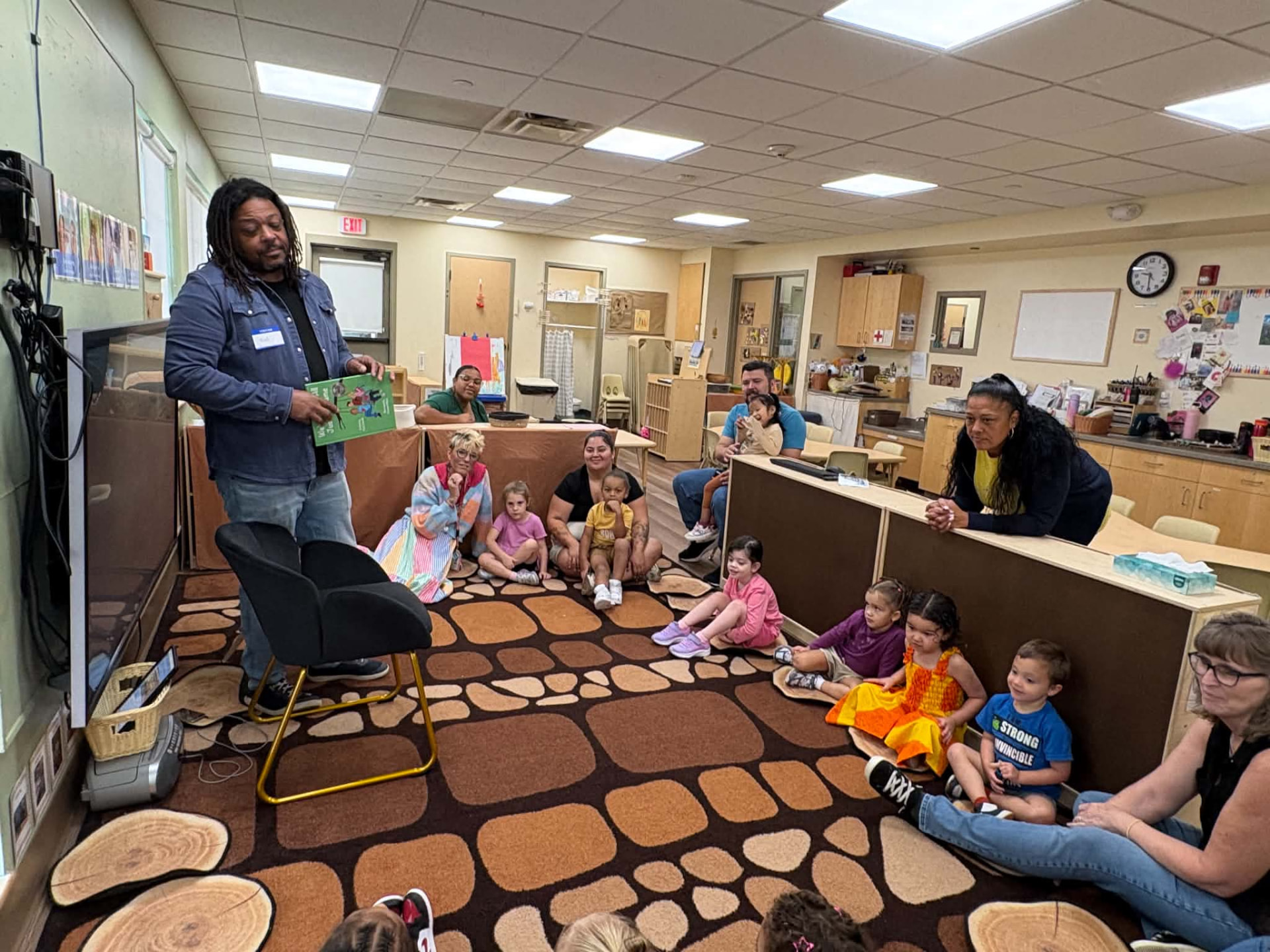 Teachers and children enjoying the story time