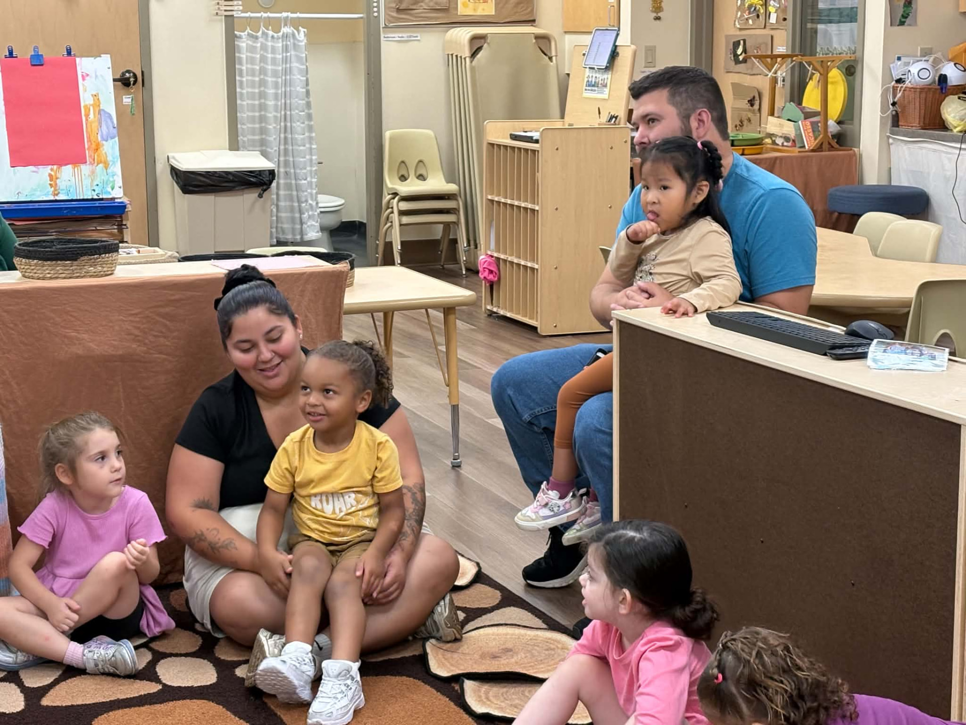 Children and parents listening to the story