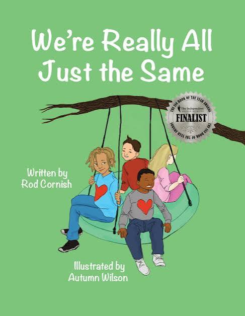 Front cover of We're Really All Just the Same, showing children on a swing